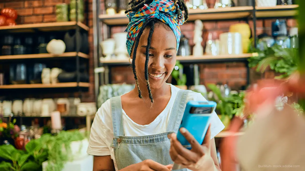 Merchant accepts a mobile payment.