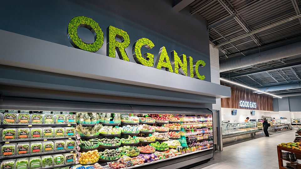 Moss was an integrated material in the signage throughout the produce department.