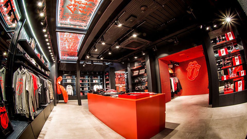 There is an exclusive and curated mix of collections and collaborations for fans of all ages. The store also introduces “Stones Red,” the official color from Pantone, which is seen in design elements, as well as an exclusive apparel and accessories collection.