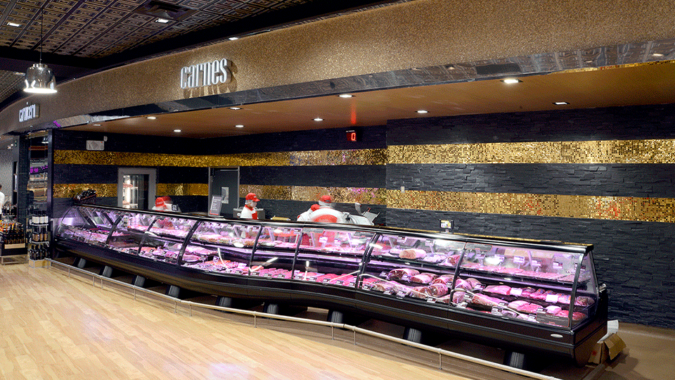 The meat and fish departments are located around the perimeter of the store.