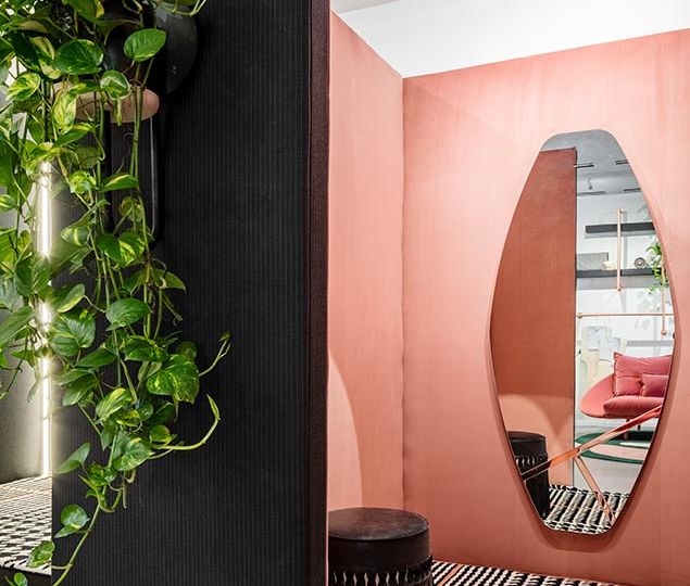 The dressing rooms were made by Deft Union, using pink velvet and pinstripes.