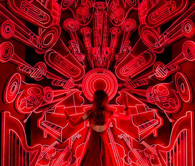 The second-place Bergdorf Goodman windows are a love letter to seven of New York City’s cultural institutions. Here, the New York Philharmonic gets a bold tribute in holiday red.