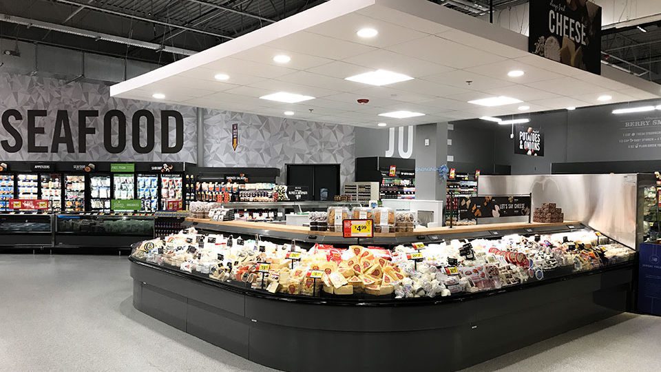 Signage and simple fixturing allow for easy navigation throughout the store.