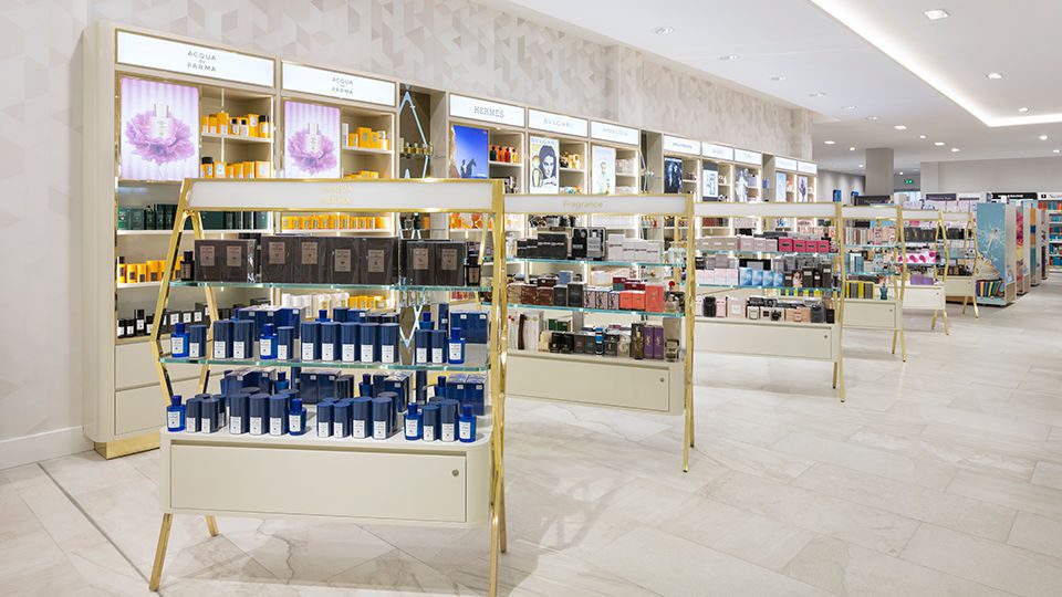 The blend of heritage and innovation is evident from the moment the customer enters the store where a triple-height atrium, floods the ground floor beauty space with natural light. An abstract geometric repeat pattern, inspired by the stylized Art Deco detailing of the nearby model town at Silver End, wraps around the interior, its sleek lines echoed in the fragrance area’s striking brass-framed furniture.