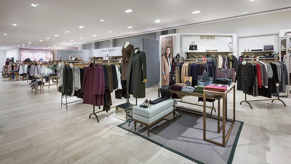 Dark metal frames and softer timbers enclose the classic offer, whilst denim and trend areas are defined by lighter woods, stainless steel and splashes of color.