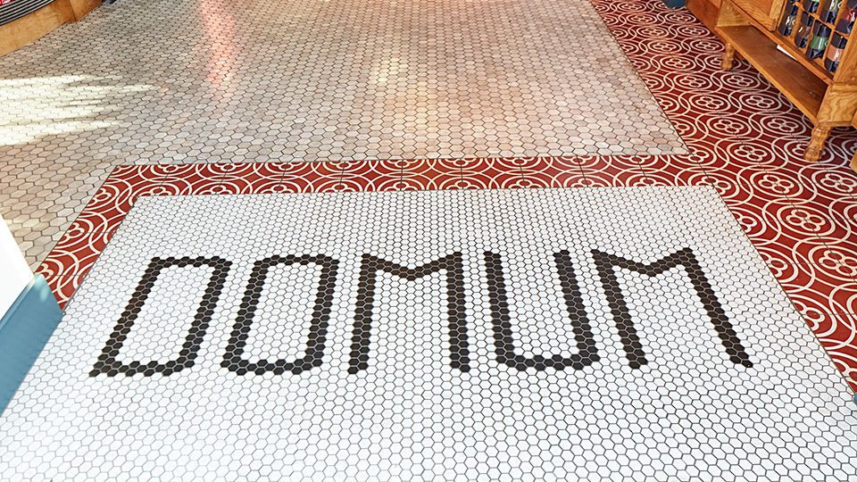 Celebrating the “nitty-gritty” materials of the built environment, Junction’s design prioritizes a pared-down, eclectic aesthetic, favoring reds, blues and natural wood tones; red tile is a nod to the timeless history of the Capitol Hill brick, and the inclusion of natural wood brings warmth. Navy blue balances this warmth, in addition to acknowledging the District’s political history.