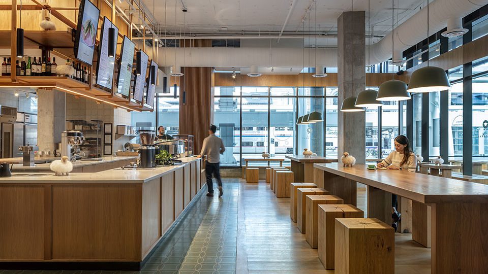 The feeling of being in Kaffe Landskap is an atmosphere of fika—a Swedish cultural attitude that encourages us to take pause, enjoyment and socialization. Fika is a daily ritual of enhancing community. The design aesthetic of Kaffe Landskap is a modern-yet-playful composition of a simple palette of materials intended to create a sense of warmth, comfort and balance—the perfect place for fika.