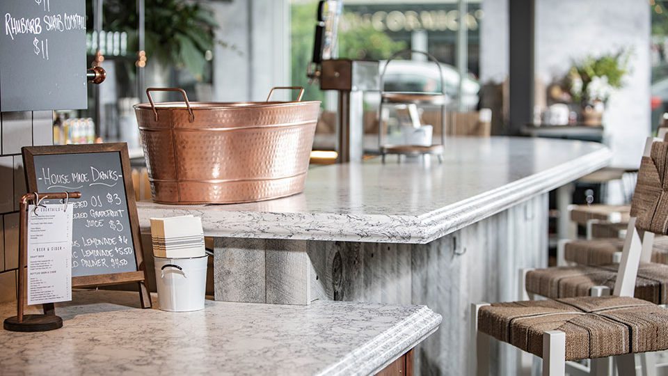 The 4,300-sq.-ft. space features Cambria’s popular Rosebay style surfacing on the countertops and around the espresso bar.