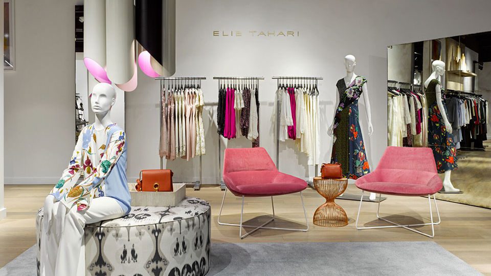 A comfortable open style living room environment is coupled with multiple layers of delightful energy met with contemporary finishes with unexpected, yet sophisticated pops of color seen throughout with built-in area rugs and furniture.