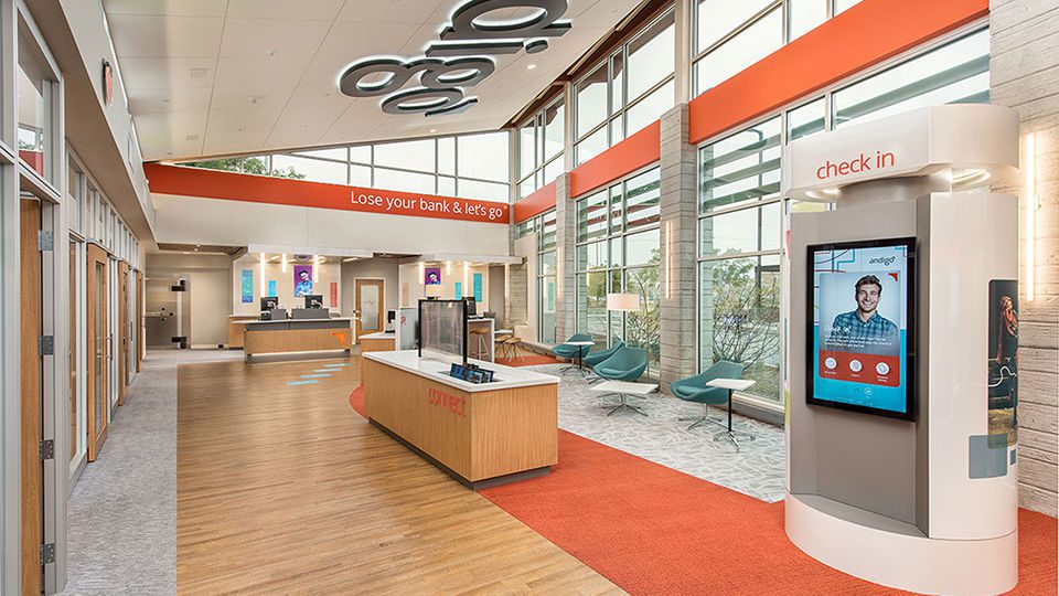 Andigo Credit Union wanted to infuse its new brand into its branches, so the company partnered with Milwaukee-based La Macchia Group to bring its brand to life starting with the Schaumburg, Ill., branch. From the custom-branded carpet to the “Andigo orange” wall coverings, elements of the brand are infused into the whole design.