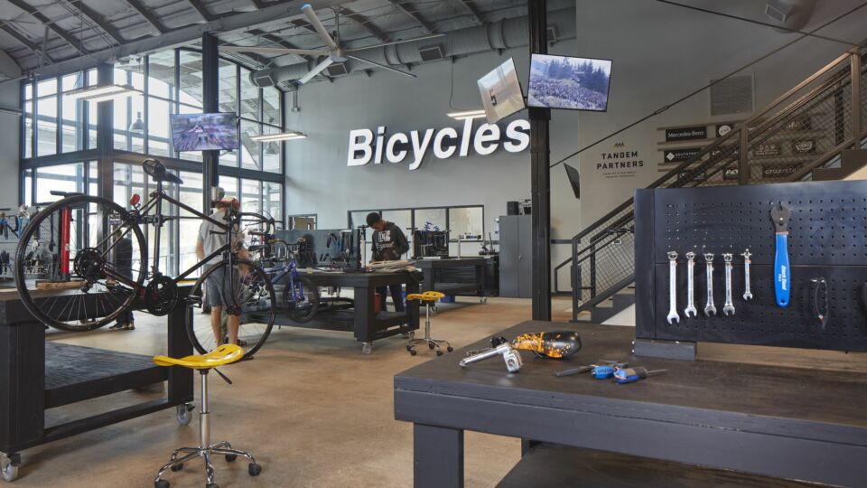 Bearings Bike Work’s new home features an industrial theme with additional workstations and breakout areas for training and mentorship, while maintaining the rich context and fabric of the neighborhood.