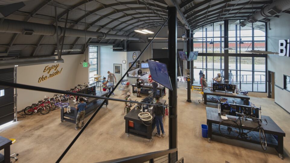 Surrounding the workstations are workshop spaces for more in-depth teaching opportunities and storage for bikes, tools and equipment. A second-floor mezzanine level addition will be equipped with added offices for employees.