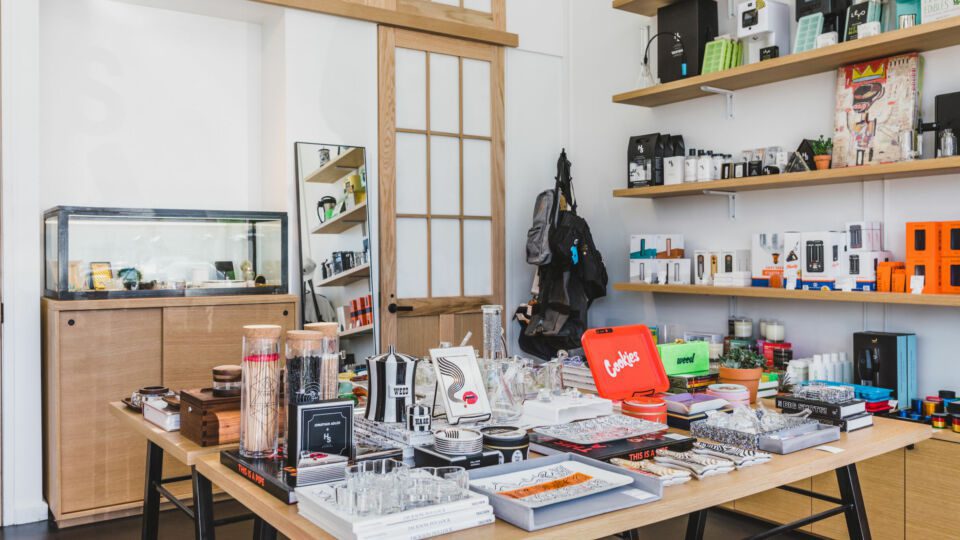 Wood tones with black accents provide a neutral backdrop for product display.