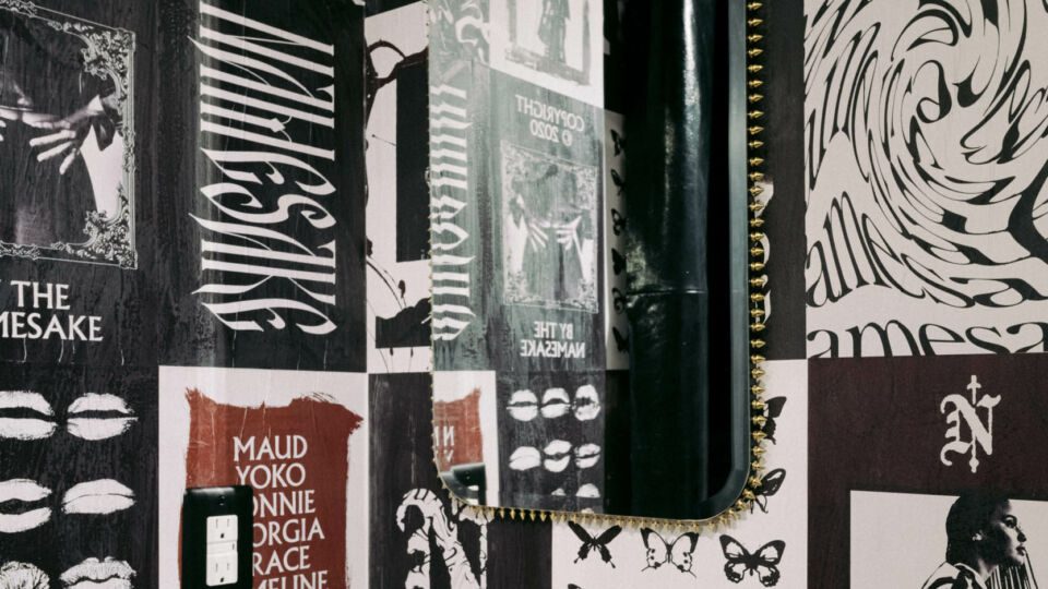 Black-and-white wallcoverings translate the rock ‘n’ roll vibe throughout the space.