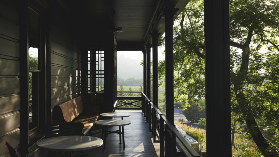 Visitors can enjoy tastings from the covered porch.