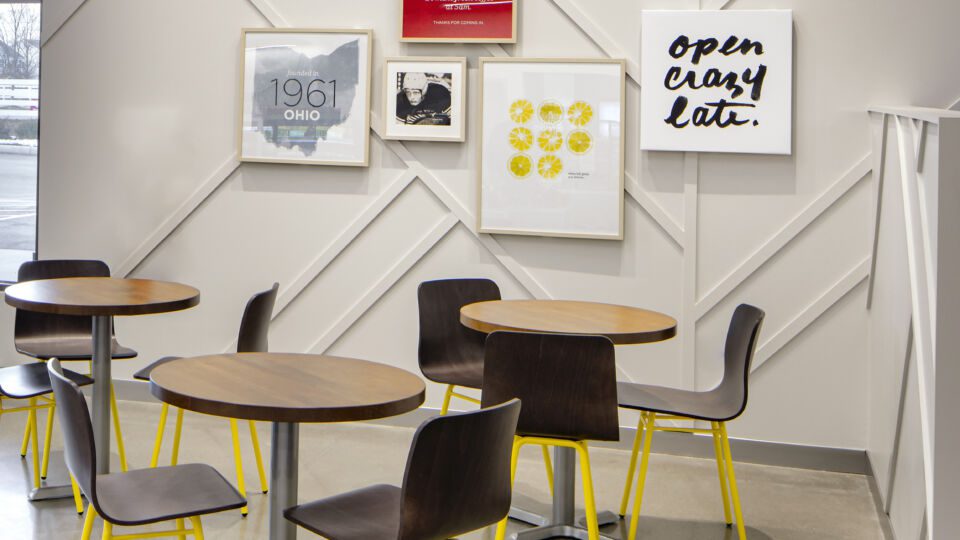 Framed imagery celebrates the brand and honors the heritage of the family-owned business.