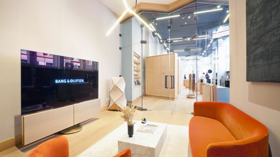 An acoustically designed “listening room” offers a residential setting, giving customers an immersive experience showing how Bang & Olufsen’s products work seamlessly together.