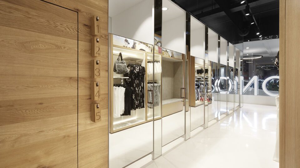 Changing rooms are also concealed behind mirrored doors. 