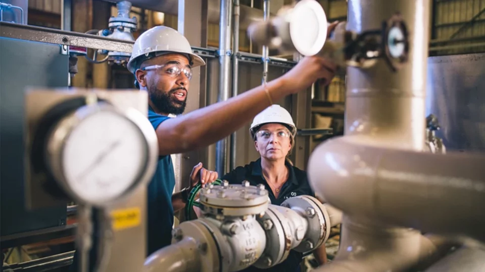 Employees at an Infinium electrofuel production facility.