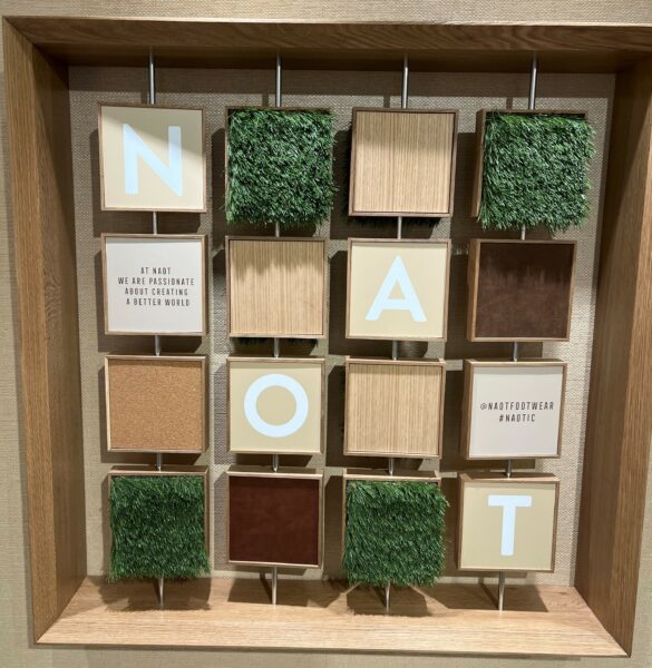 A custom mural on the back wall incorporates real cork and leather from Noat's operations.