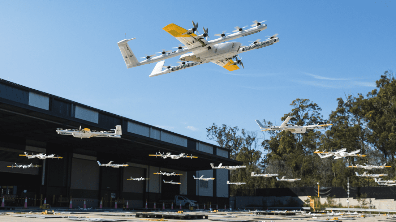 A fleet of Wing drones taking off