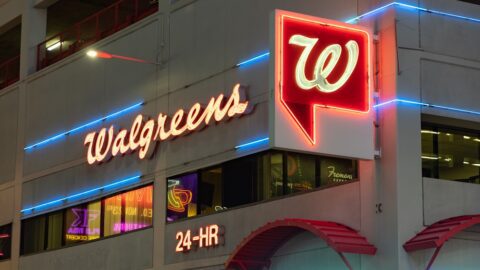Walgreens storefront at night.