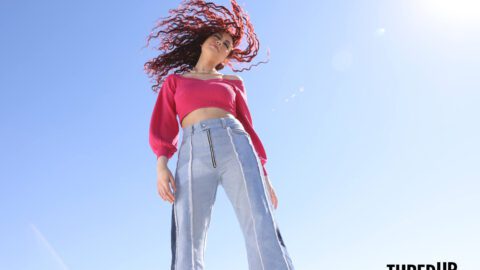 Consumer in thrifted clothes bought in online resale.