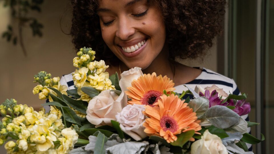 Woman receiving flowers