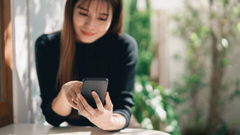 Woman text messaging