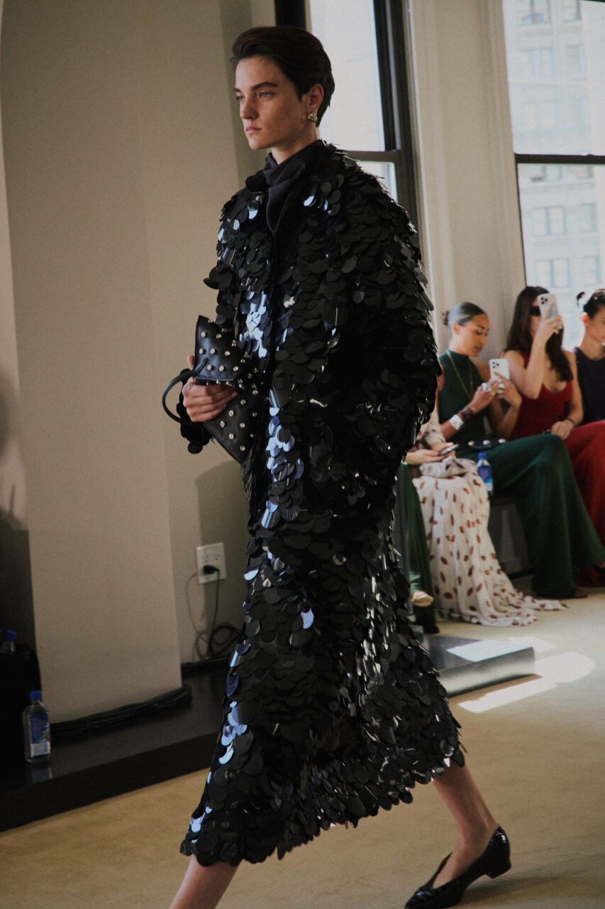 An SS22 look on the SS26 Altuzarra runway.