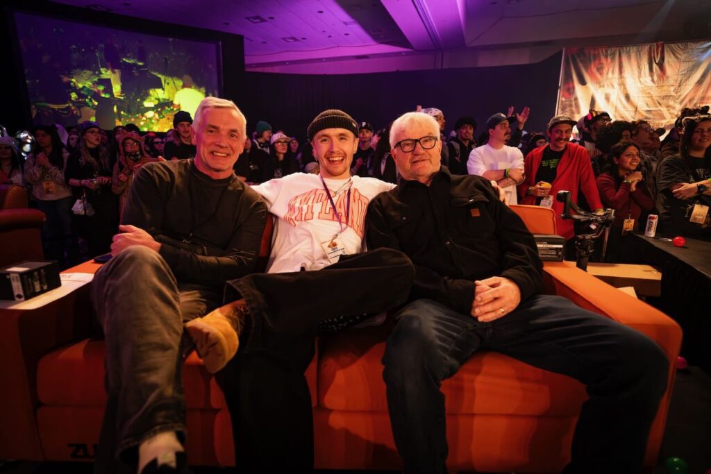 No. 1 seller Cooper Walker, middle, with CEO Rick Brooks, left, and founder and Chairman Tom Campion, right.