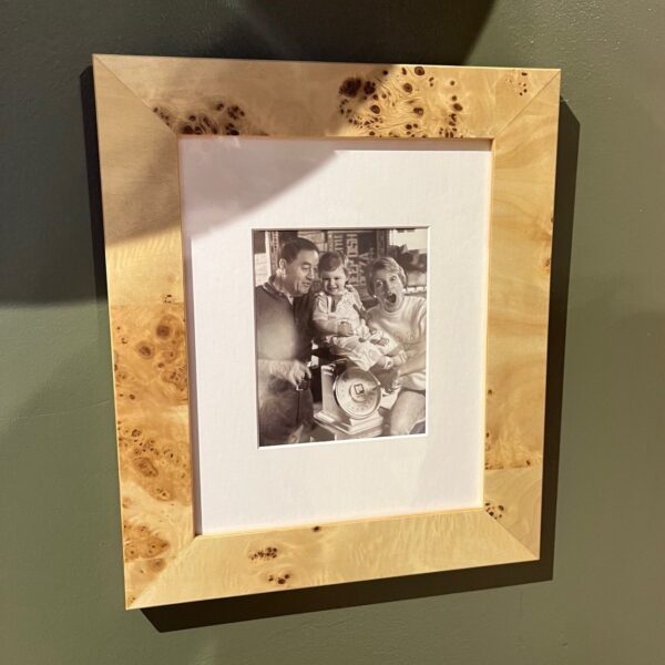 A photo of baby Erika with her parents, Wine Enthusiast founders, Adam and Sybil Strum, adorns the brand's new SoHo shop.